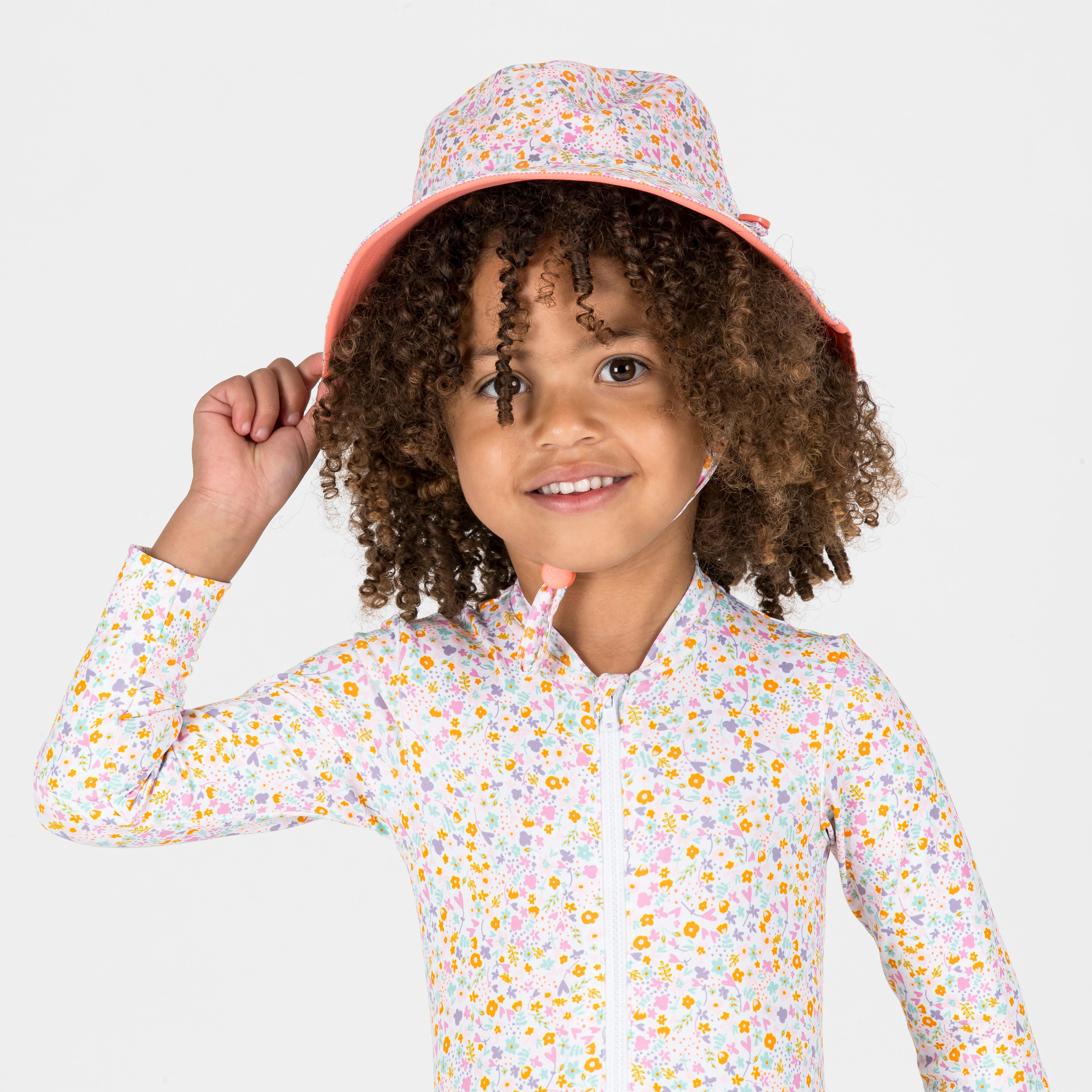 Sonnenhut Baby UV-Schutz wendbar - Blumendruck koralle