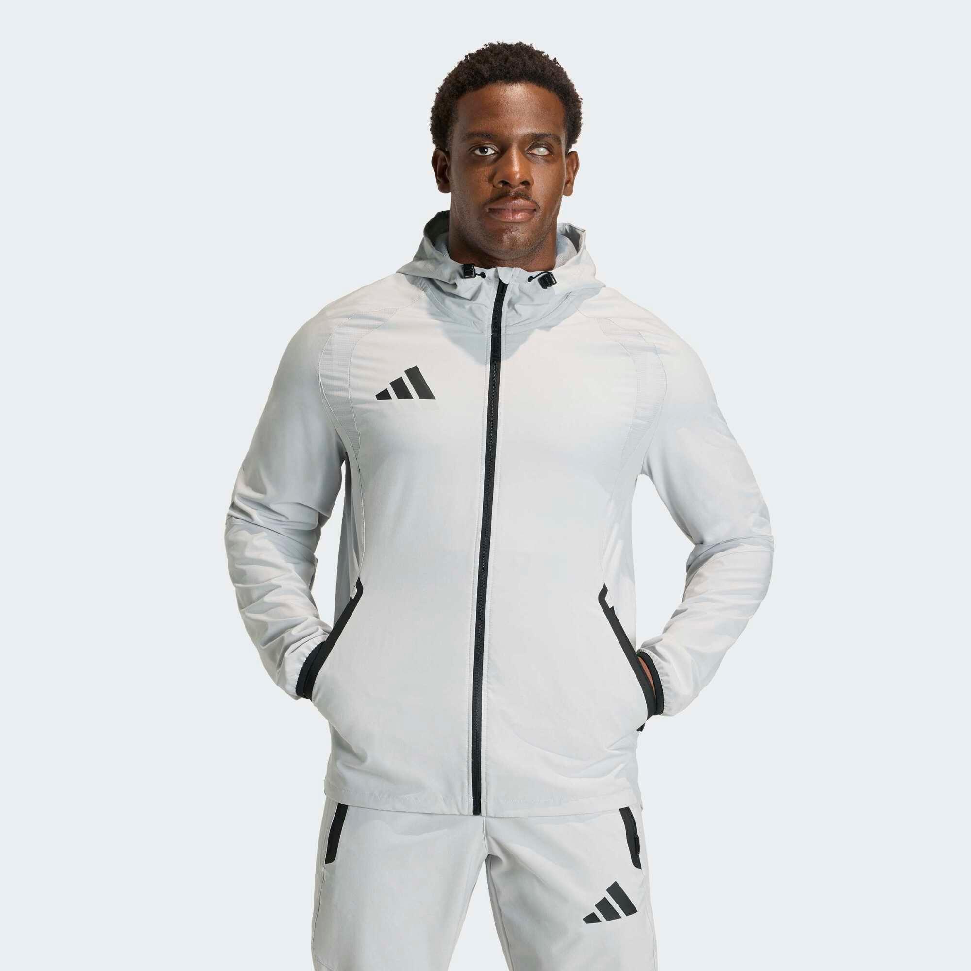 Damen/Herren Trainingsjacke - adidas Tiro Travel 26 grau
