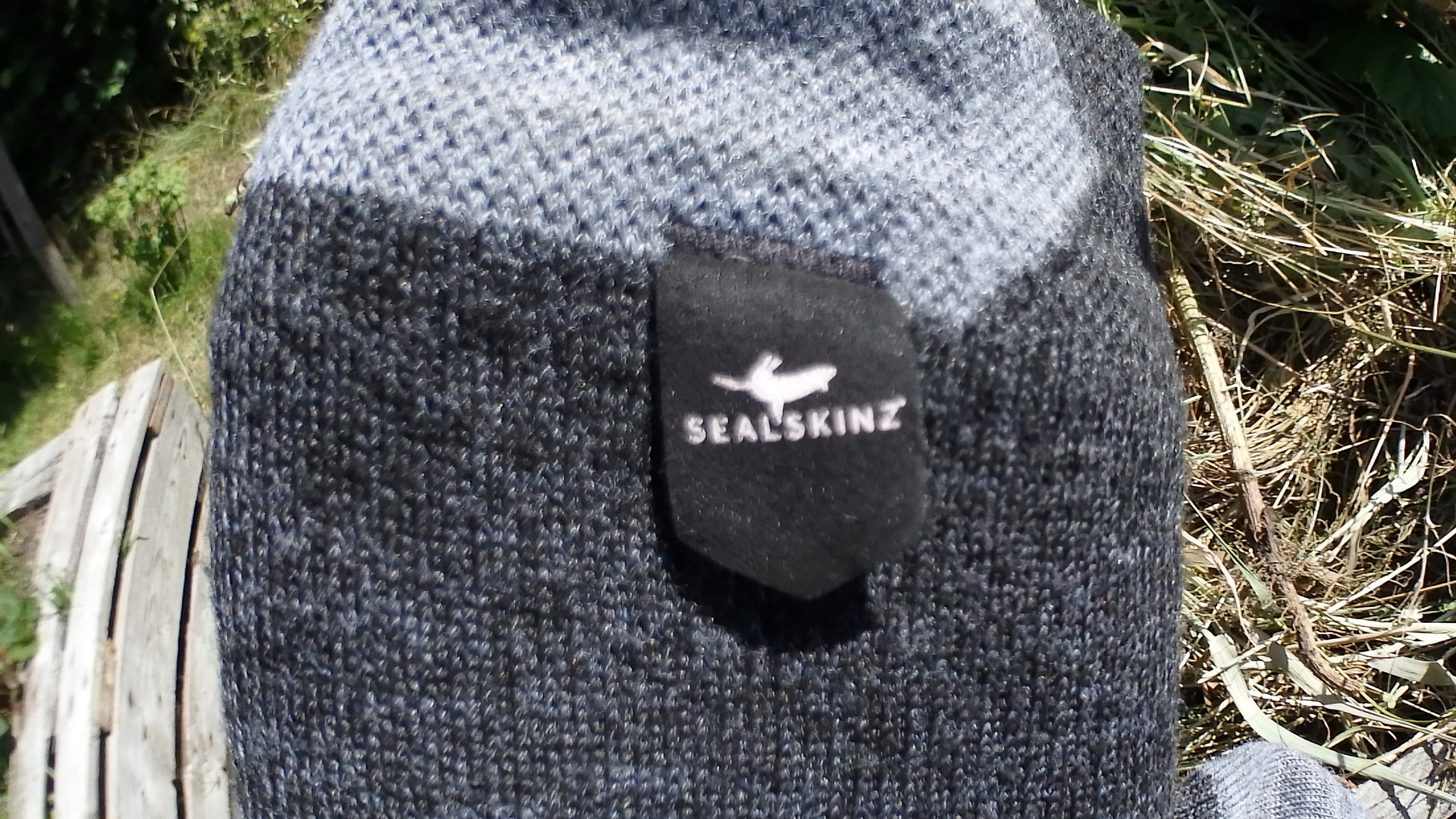 Schild am rechten Socken