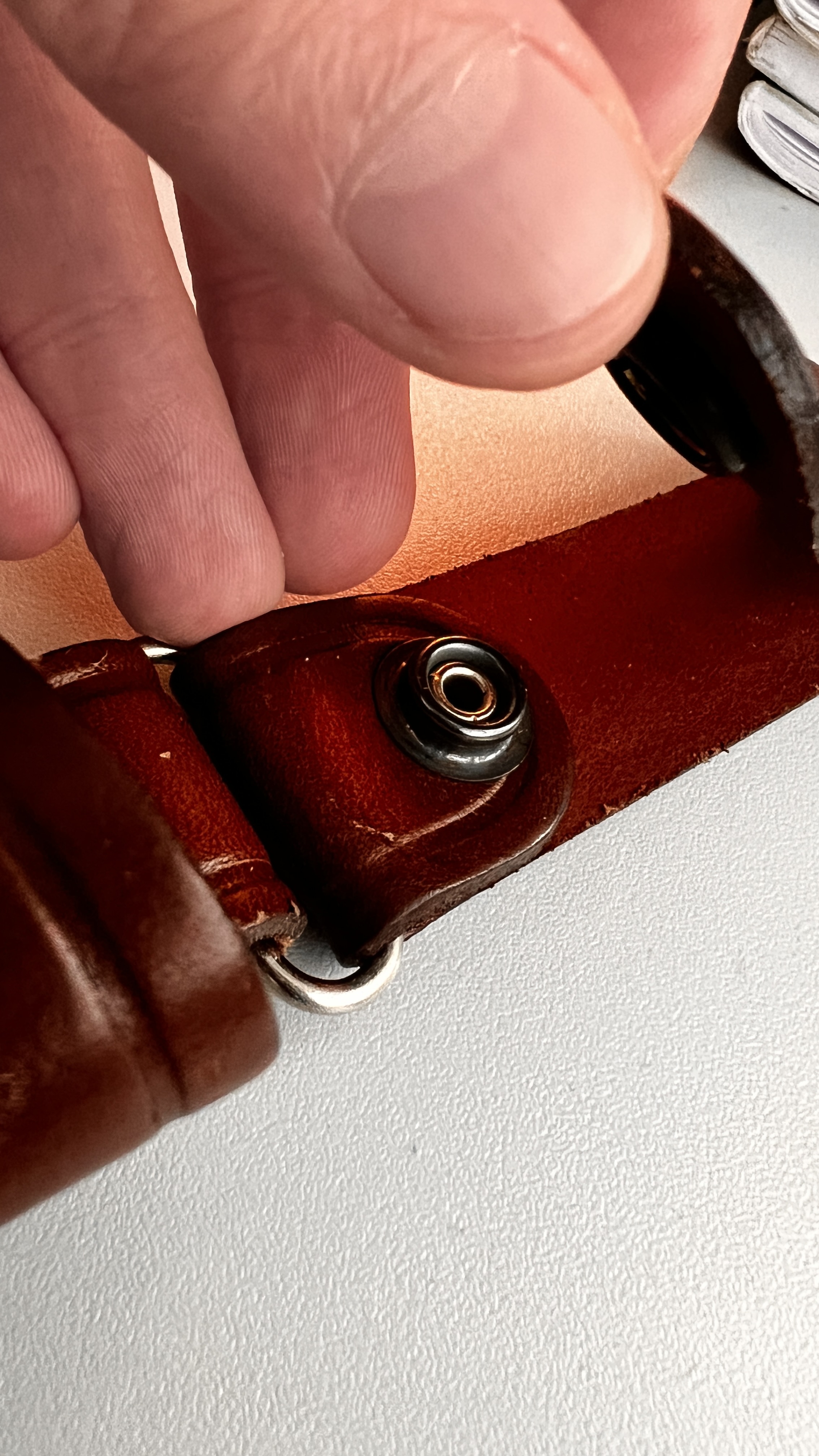 Druckknopf an Zusatzschlaufe