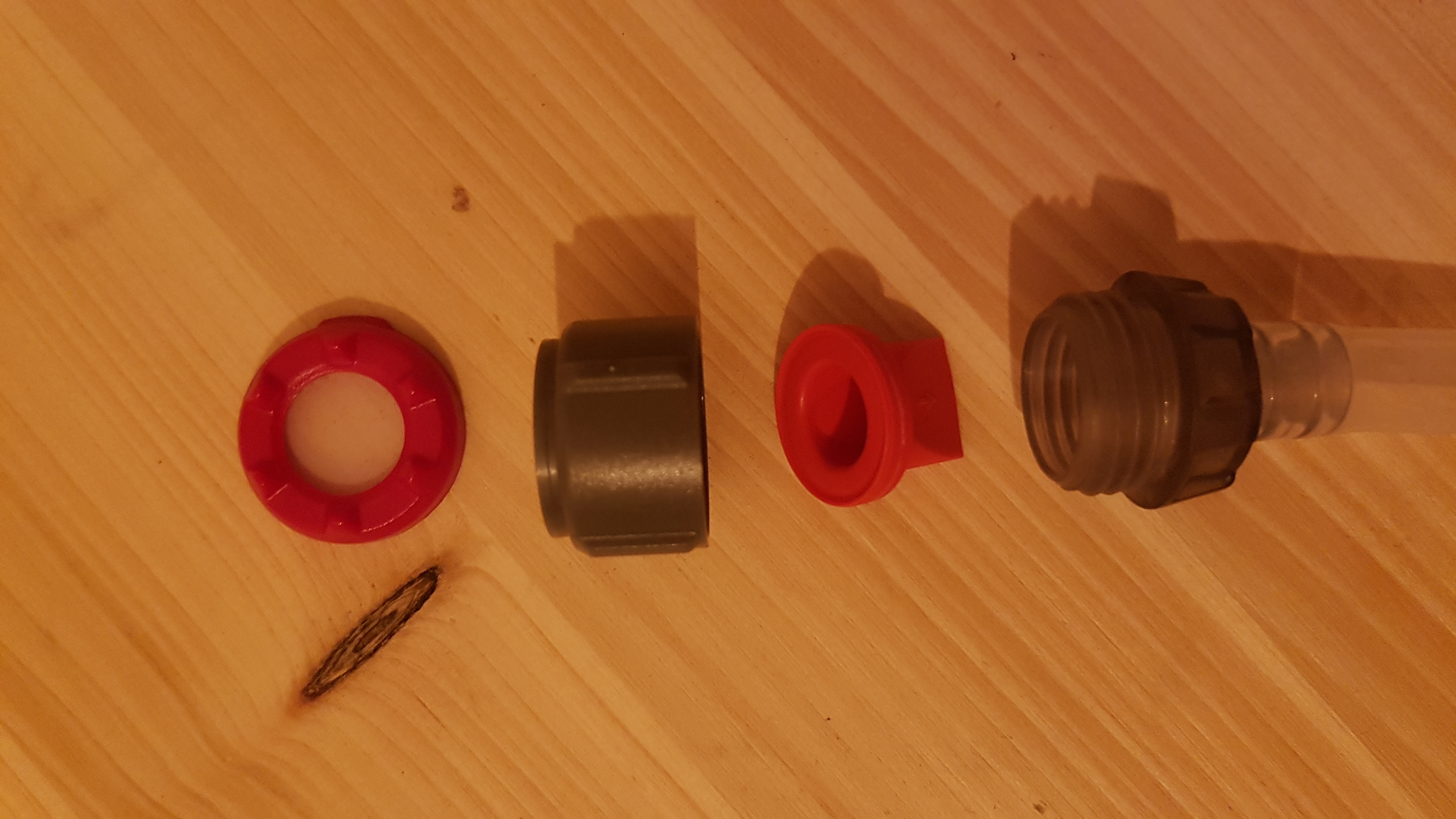 Schlauchende mit Ventil und Vorfilter