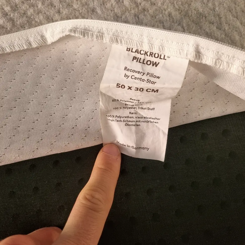 Etikettenschild mit Materialzusammensetzung