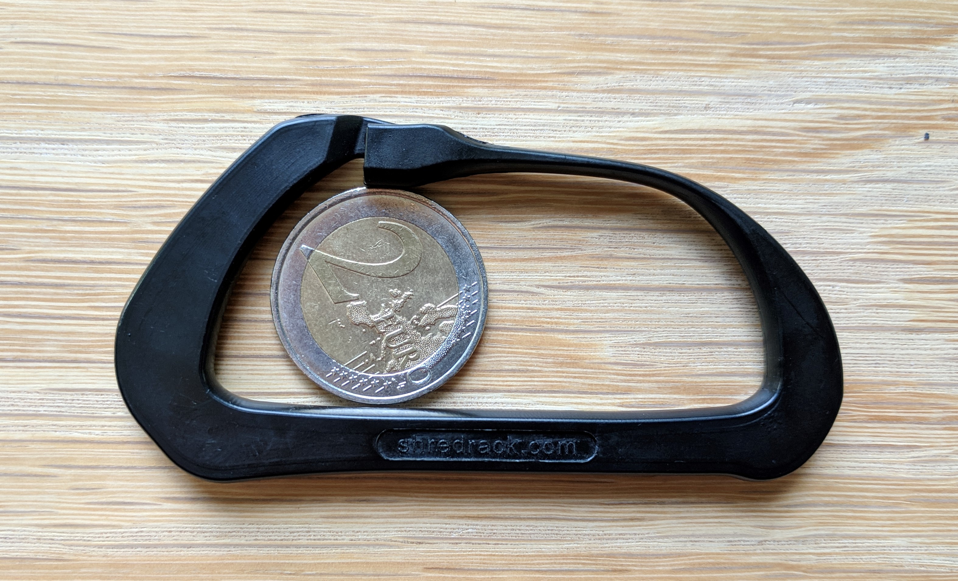 Karabiner mit 2€ Münze