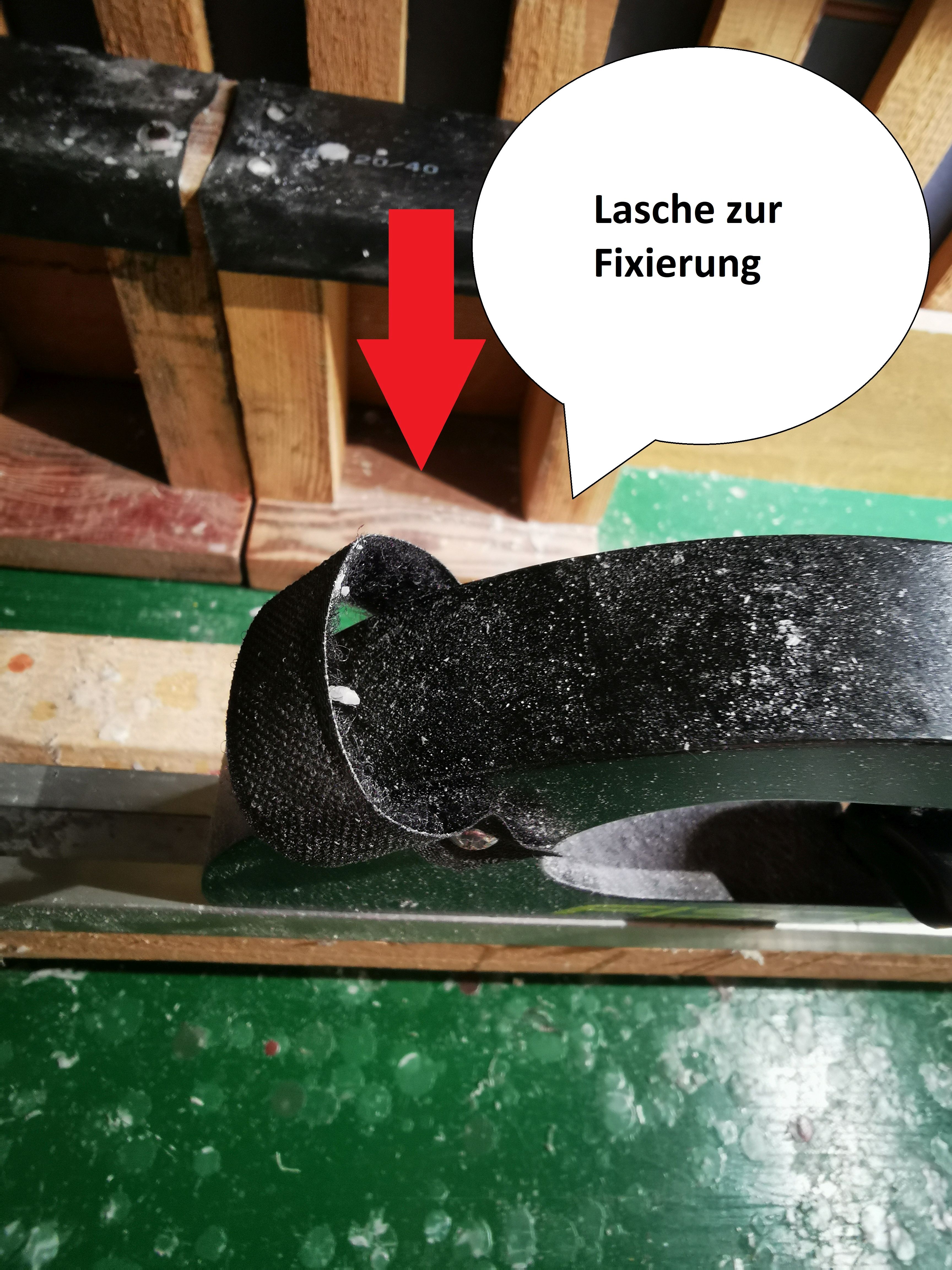Lasche zur Fixierung