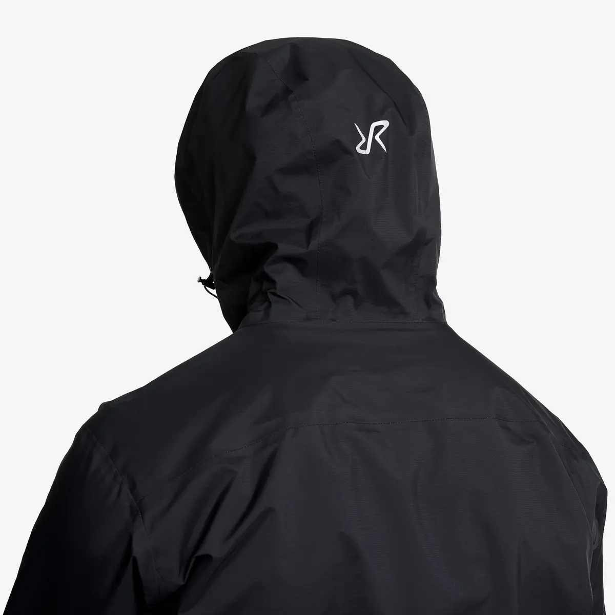 Der kompetente OUTSIDEstories-Test: REVOLUTION RACE Arcade 3L Lightweight Jacket - Hardshelljacke, Herren